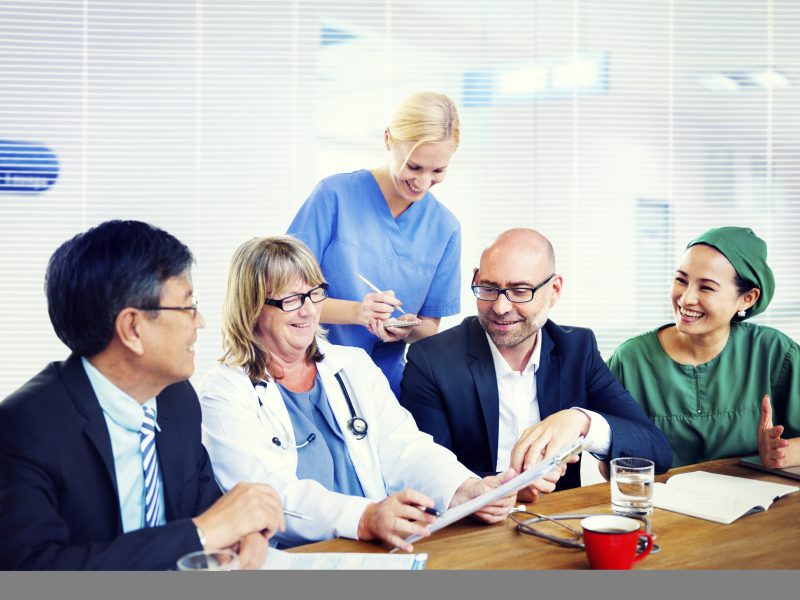 Group of general practitioners having a meeting.